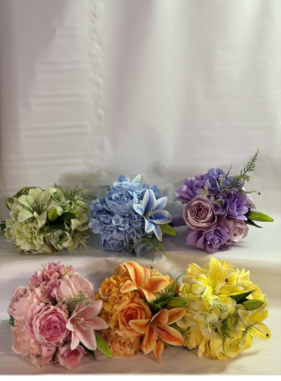 Floral wall backdrop with gold photo frame