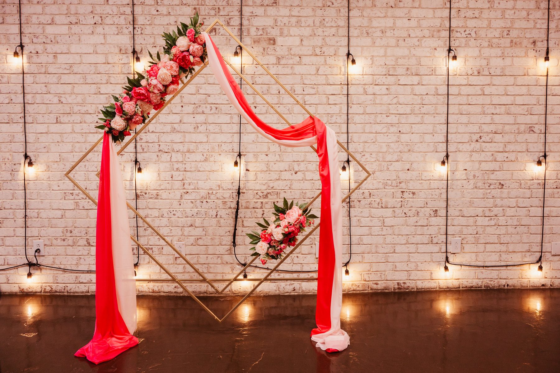 Geometric ceremony arch installation